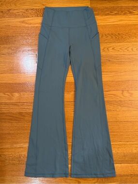 Fabletics High RIse 29" Flare Pants in Aqua (Blue/Green) - Size Small Pockets